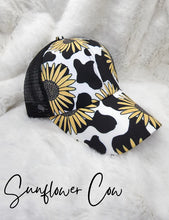 Load image into Gallery viewer, Cow Print Criss-Cross Ponytail Hat
